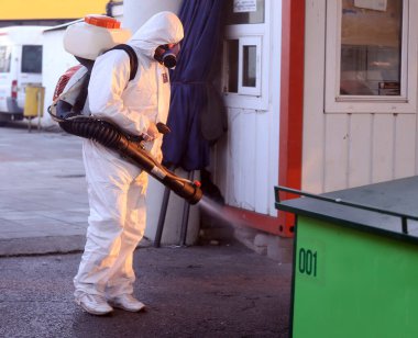 2019 Coronavirus hastalığına karşı önlem olarak halka açık bir yerde ilaçlama, dezenfekte ve arındırma, COVID-19. Koronavirüs üzerinde acil durum, karantina