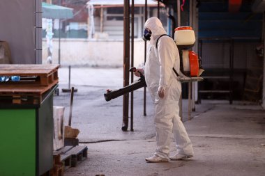 2019 Coronavirus hastalığına karşı önlem olarak halka açık bir yerde ilaçlama, dezenfekte ve arındırma, COVID-19. Koronavirüs üzerinde acil durum, karantina
