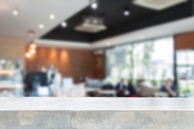 Beton masa üstü bulanık kafe