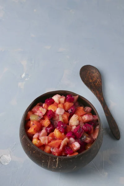 Tropical Fruit Salad Coconut Bowl Light Blue Background Vertical Format — Stock Photo, Image