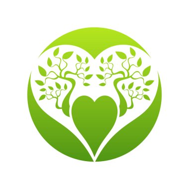 Arka planda ağaç dalları olan yeşil aşk işareti