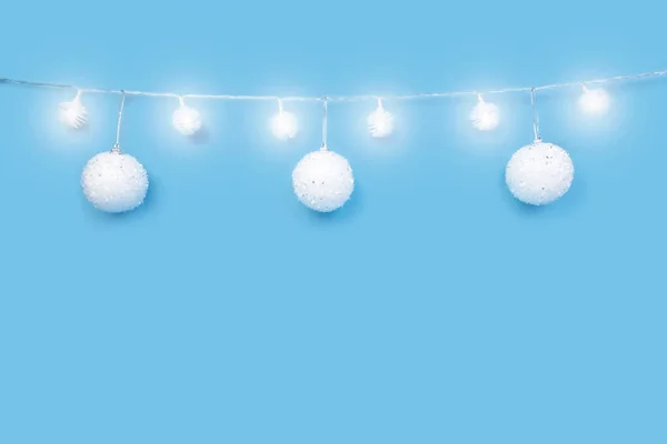 Christmas ornaments on cyan blue background