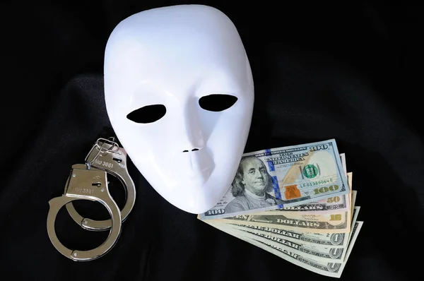 White Plastic Theater Masks Handcuffs Money Royalty Free Stock Images