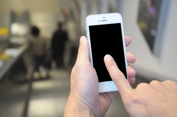 Play Cellphone Using Escalator Stock Image