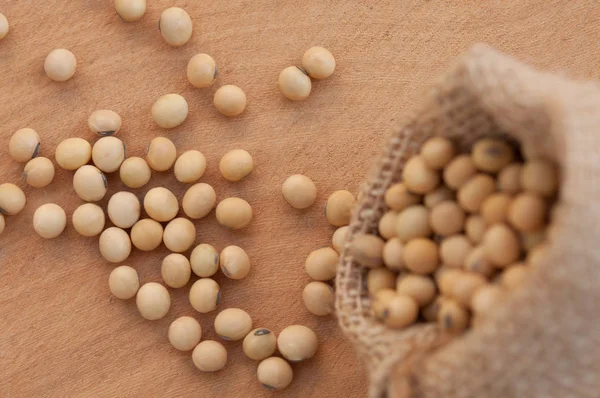 Raw Soy Beans Sack Wooden Table Top View Background Stock Picture