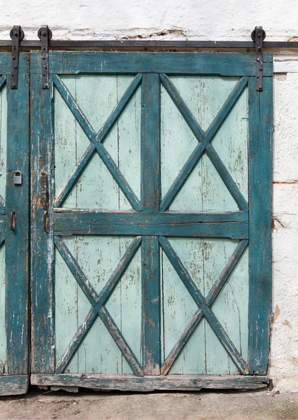 Old green turquoise coloured wood door — Stock Photo, Image