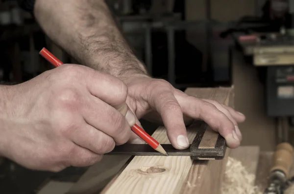 Woodworker and red pencil — Stock Photo, Image