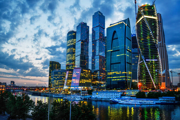 Fantastic view on Moscow-city at Sunset time with pink color and grey-blues clouds !