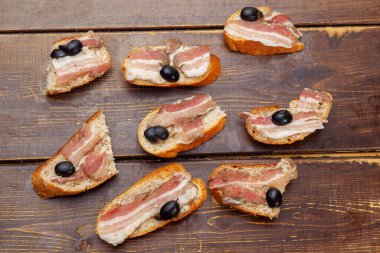 bacon sandwich on brown table - nutritious  food  - salted pork  with bread
