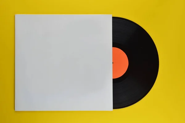 Old Black Vinyl Record Blank Orange Label Halfway Out Its — Stock Photo, Image