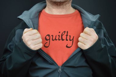 a man with the word GUILTY written on his red t-shirt showing it while opening his jacket with both hands clipart