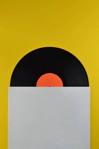 Gammal Svart Vinylskiva Med Tom Orange Etikett Halvvägs Sin Vita — Stockfoto