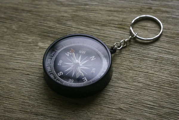 Compass on a wooden background. — Stock Photo, Image