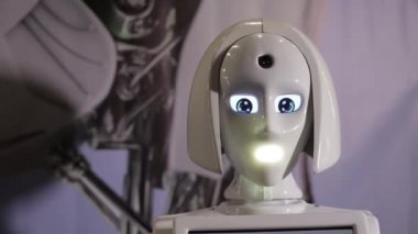 Kharkiv, Ukraine - 09 November 2019: Close up of female robot head. Robots emotions. The robot looking at camera. Modern Robotic Technologies. Modern Robotic Technologies. artificial intelligence