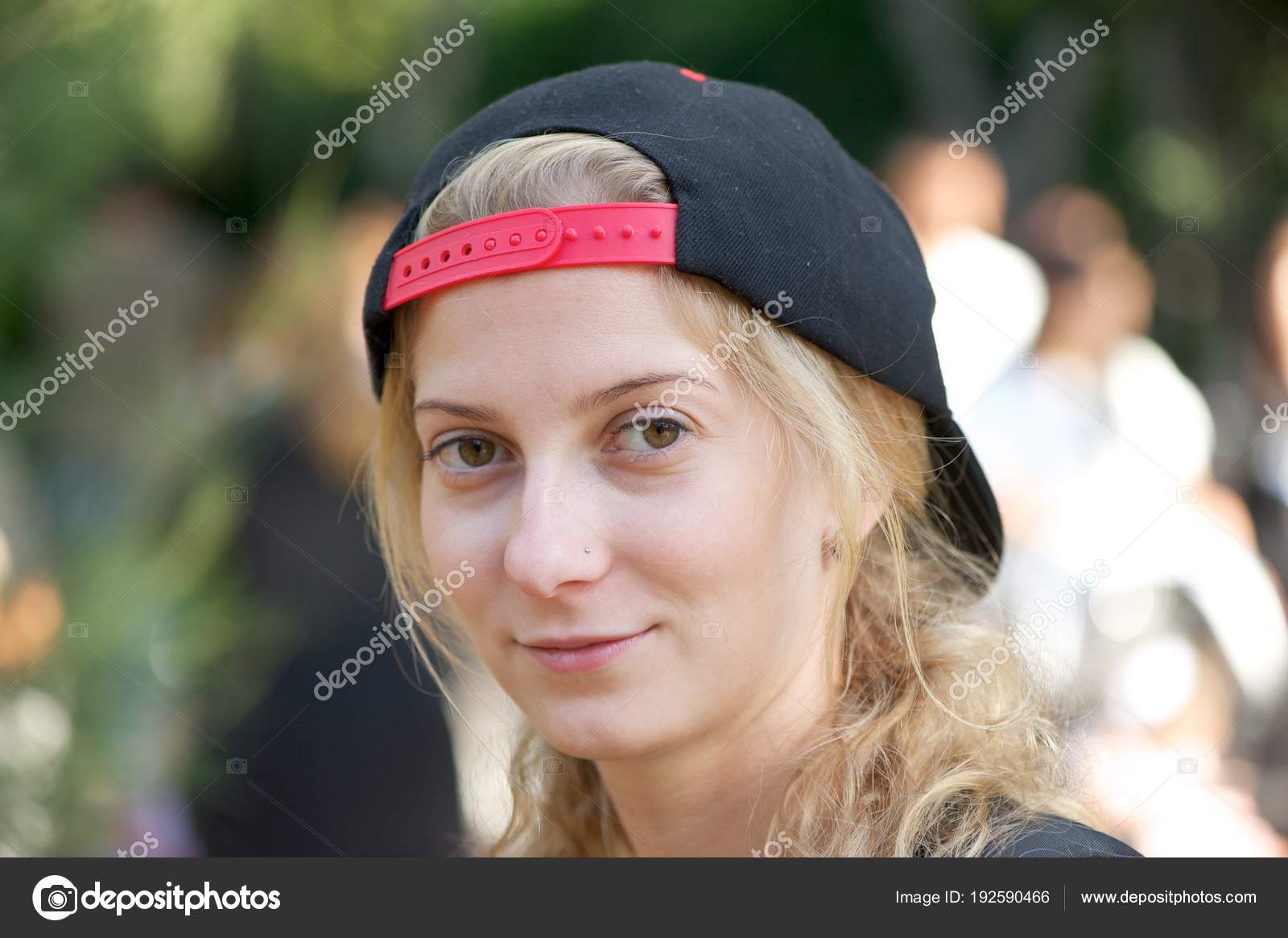 wearing ball cap backwards