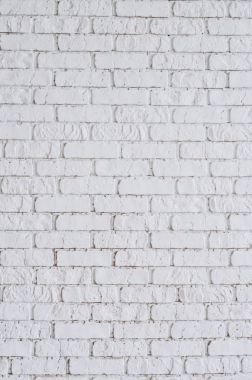 Beyaz tuğla duvar dokulu. Dikey. Alanı temizleyin