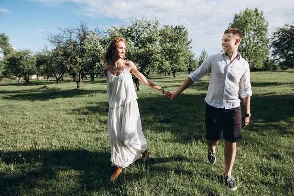 Handsome Young Guy Walks His Attractive Girlfriend Garden Holding Hands — Stock Photo, Image