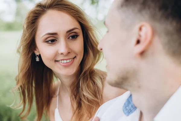 Beautiful Blonde Looks Her Boyfriend Love Smiling Sitting Gras — Stock Photo, Image