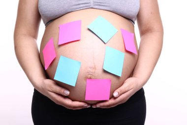 Güzel hamile bir kadının portresi.