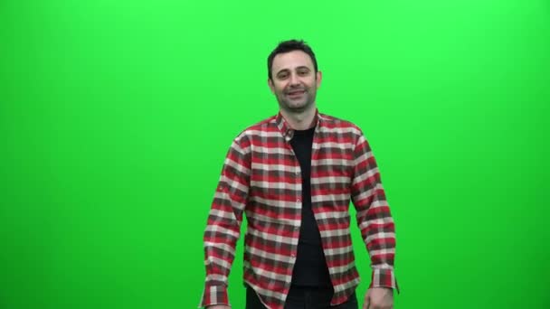 Young Man Crossing Arms Green Screen — Stock Video