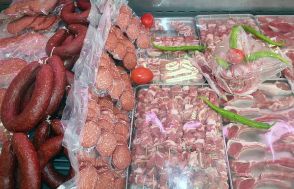 Fresh Food Market with Raw Meat and Salami Sausages