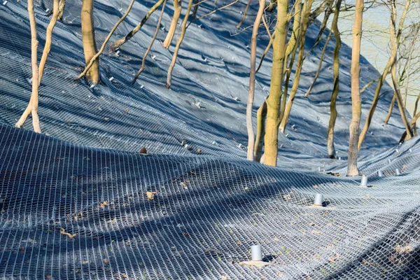 Mountain slope reinforced metal mesh — Stock Photo, Image