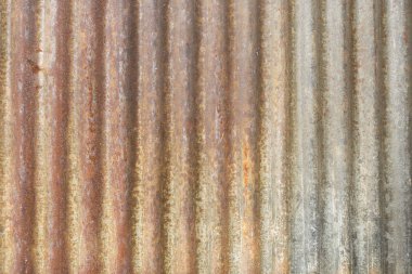 Paslı kıvrımlı demir metal dokusu.