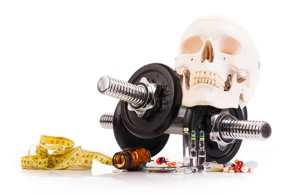 Metal dumbbells with drugs — Stock Photo, Image