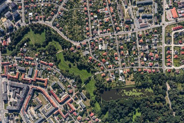 Aerial view of green plants and buildings in city center at Nysa city in Poland