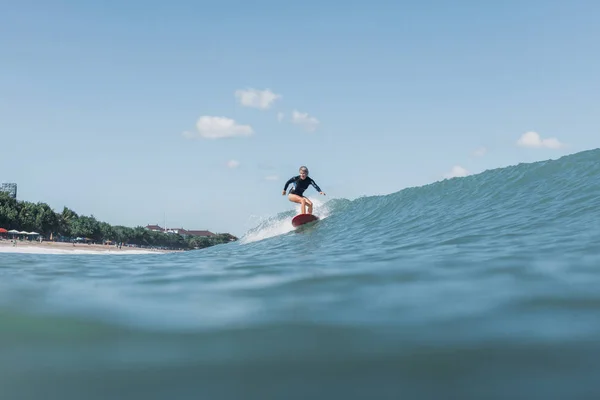 Female Surfer Riding Wave Surf Board Ocean — Free Stock Photo