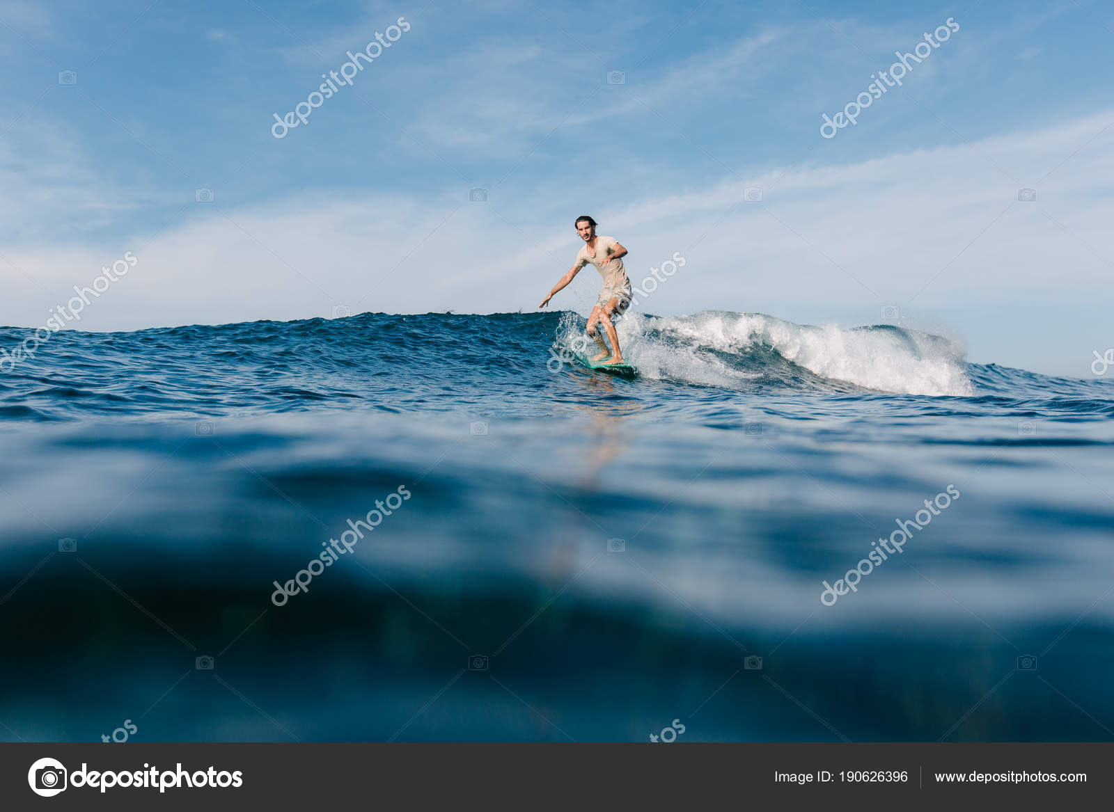 Handsome Man Wet Shirt Riding Ocean Waves Surfboard Stock Photo