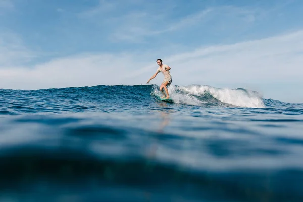 Handsome Man Wet Shirt Riding Ocean Waves Surfboard — Stock Photo, Image