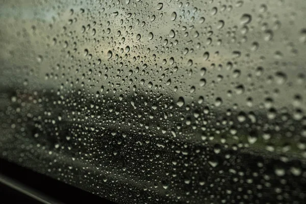 Σταγόνες Βροχής Ένα Παράθυρο Αυτοκινήτου Βροχερό Φόντο Μεγάλες Πτώσεις Και — Φωτογραφία Αρχείου