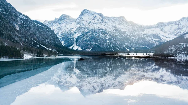 Austrian mountain, shot with a drone, Austrian alps, winter time, beautiful winter nature, frozen lake