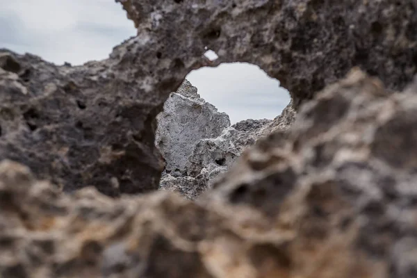 great rock texture close up photography, blue sky background