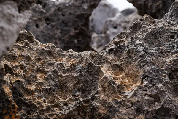 great rock texture close up photography, blue sky background