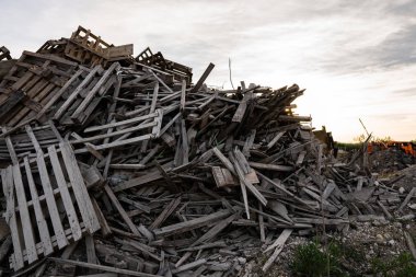 Stacked wooden pallets on a mine pit in Germany