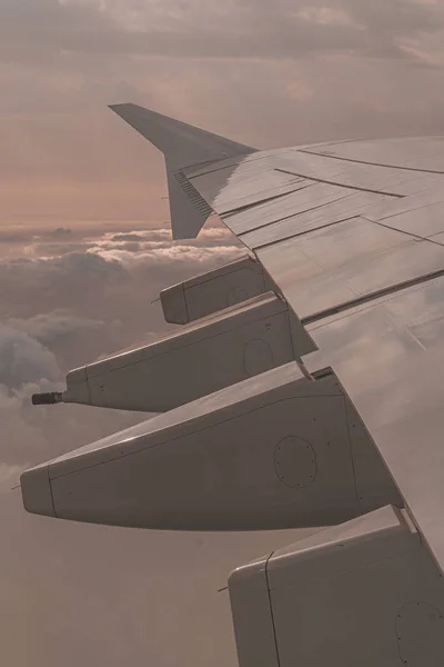 Airplane wing through the airplane window — 스톡 사진