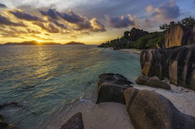 sunset at paradise beach,anse source d'argent,la digue,seychelle