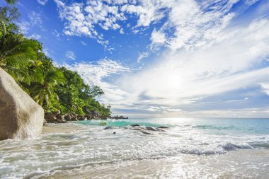sunny day on paradise beach anse georgette,praslin seychelles 36 clipart