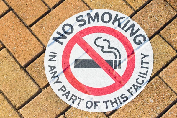 No smoking warning sign floor outdoor