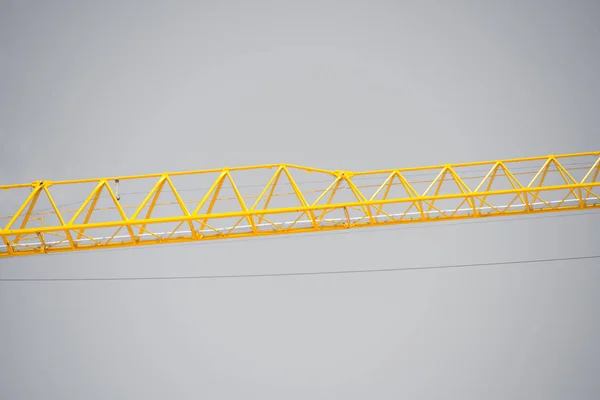Construction crane filtered grey sky — Stock Photo, Image