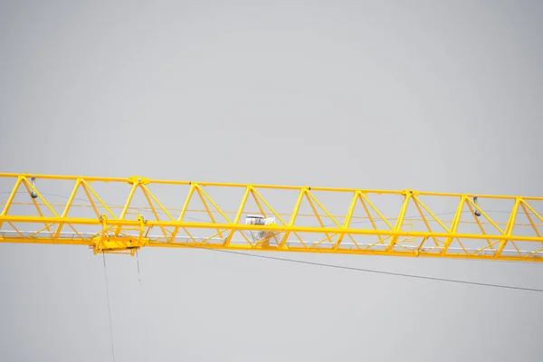 Construction crane grey sky background — Stock Photo, Image