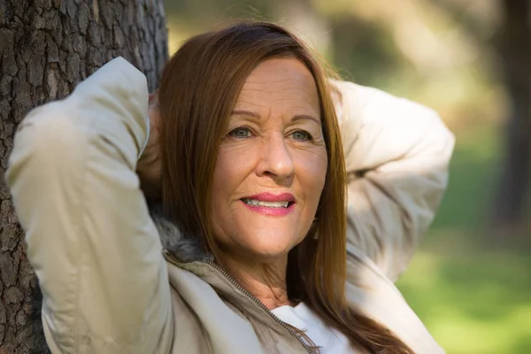 Happy relaxed woman confident outdoors