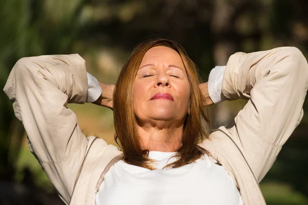 Happy relaxed woman closed eyes outdoor — Stock Photo, Image