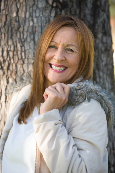 Joyful Mature woman winter jackte outdoor — Stock Photo, Image