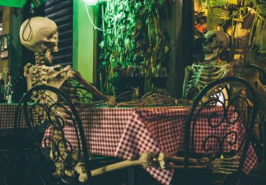 Skeletons on a date clipart