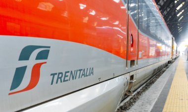 Close up of Trenitalia train at Milan's Central Station, a major rail hub in northern Italy with connections throughout Italy. Opened in 1931 clipart