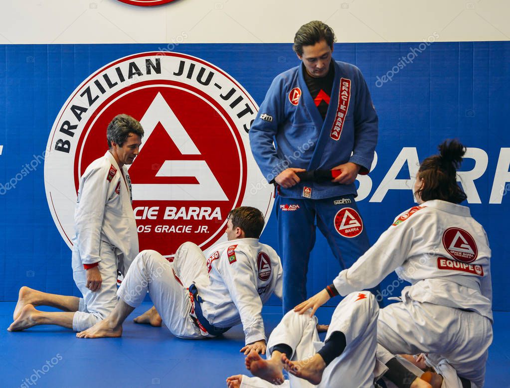 London, UK - March 10, 2018: Brazilian Jiu Jitsu mixed martial arts grappling training at Fulham Gracie Barra academy in London, UK