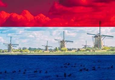 Beautiful dutch windmill landscape at Kinderdijk in the Netherlands clipart